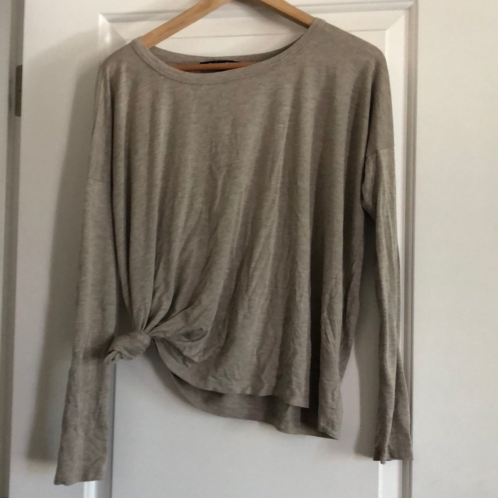Grayish tan light long sleeved shirt